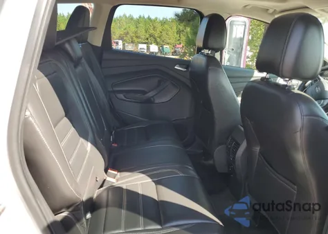 2017 Ford Escape Titanium z USA, uszkodzony, nr VIN 1FMCU0JD6HUA87521